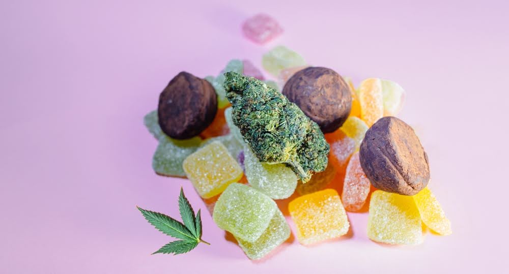 selection of cannabis edibles and flower against a lavender background