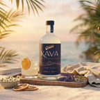 Oasis Kava Sunset Citrus bottle with a citrus mocktail on a beach at sunset, surrounded by chamomile and lavender.
